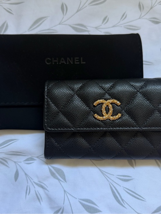CHANEL Handbags - CHANEL Black Quilted Caviar Leather Wallet with Gold CC Emblem